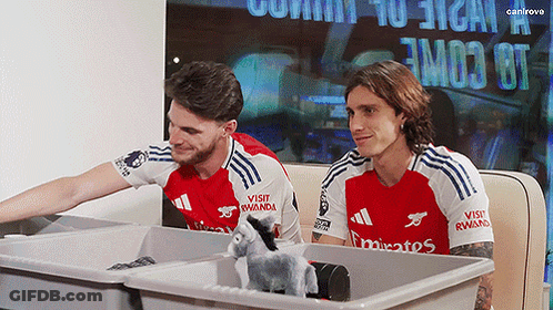Man In Red Emirates Jersey Close Up GIF
