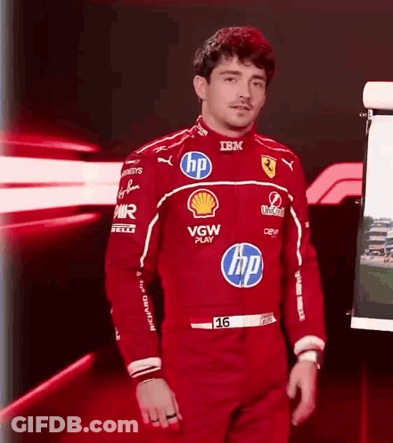 Man In Red Ferrari Racing Suit GIF