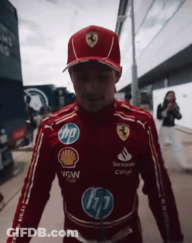 Man In Red Ferrari Uniform And Hat GIF