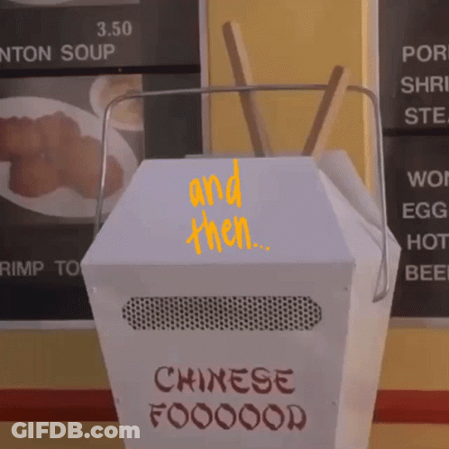 Man In Red Flash Suit Talking On Phone GIF