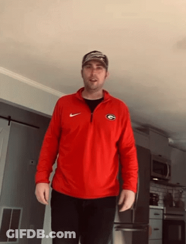 Man In Red Georgia Bulldogs Shirt In Kitchen GIF