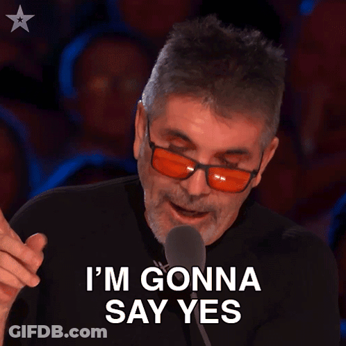Man In Red Glasses And Black Shirt Saying I'm Gonna Say Yes GIF