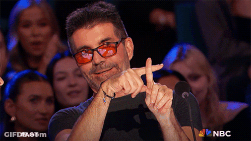 Man In Red Glasses Giving Thumbs Up GIF