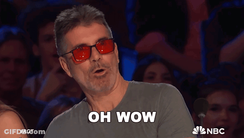Man In Red Glasses Saying Oh Wow GIF