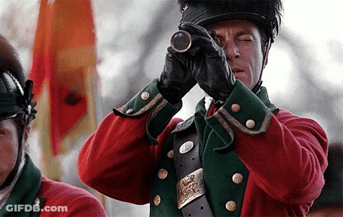 Man In Red-Green Military Uniform Using Telescope GIF