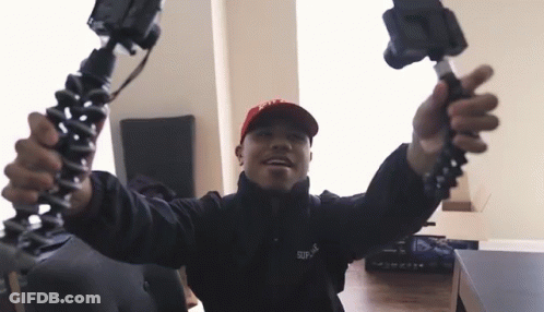 Man In Red Hat And Black Jacket Supreme GIF