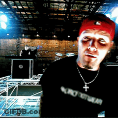Man In Red Hat And Black Shirt Saying Euro GIF