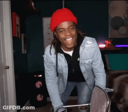 Man In Red Hat And Denim Jacket GIF