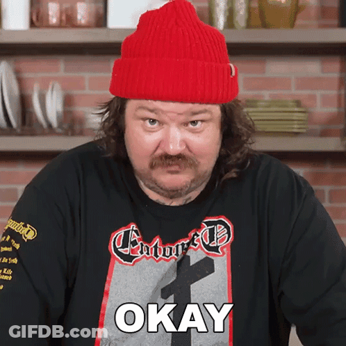 Man In Red Hat And Okay Shirt GIF