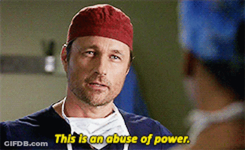 Man In Red Hat And Scrubs Saying This Is An Abuse Of Power GIF
