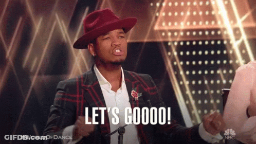 Man In Red Hat And Suit Says Let's Goooo GIF