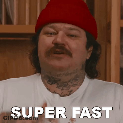 Man In Red Hat And White Shirt Saying Super Fast GIF