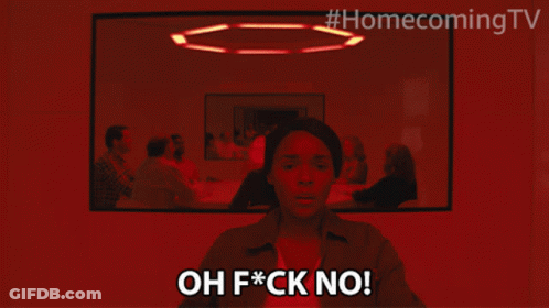 Man In Red Hat Holding Cup Next To Man In Striped Shirt GIF