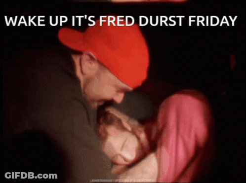 Man In Red Hat Hugging Woman Saying Wake Up It's Fred Durst Friday GIF