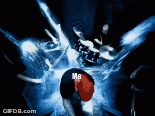Man In Red Hat Kneeling At Drum Set Saying Me GIF