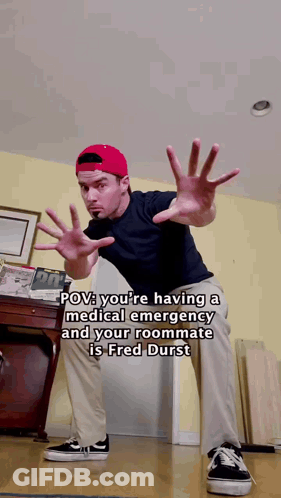 Man In Red Hat Making Funny Face GIF