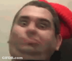 Man In Red Hat Making Funny Face GIF
