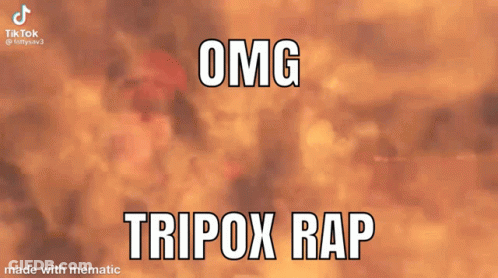 Man In Red Hat Making Funny Face Saying OMG Tripox Rap GIF