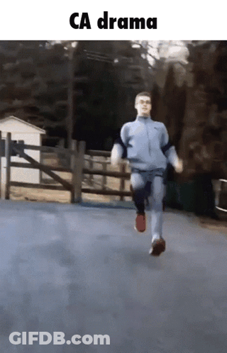 Man In Red Hat Running On Beach GIF