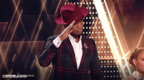 Man In Red Hat Saluting On World Of Dance GIF