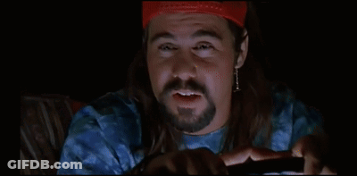 Man In Red Hat Says Slurpee In Dark Room GIF