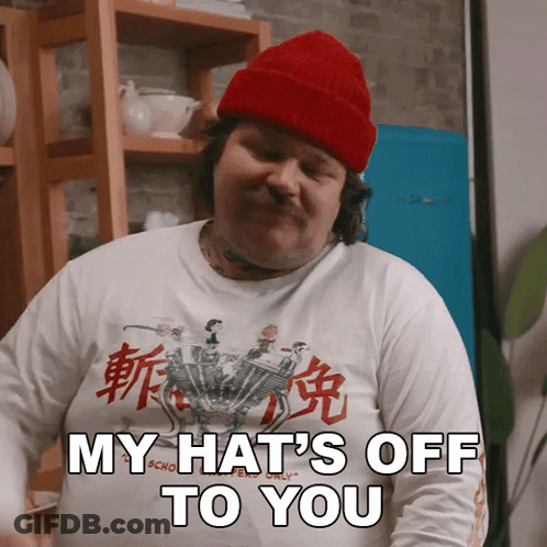 Man In Red Hat Shirt Says My Hat's Off To You GIF