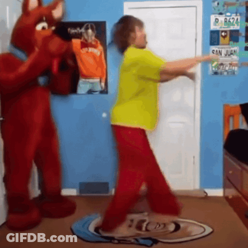 Man In Red Hat Sitting At Microphone GIF