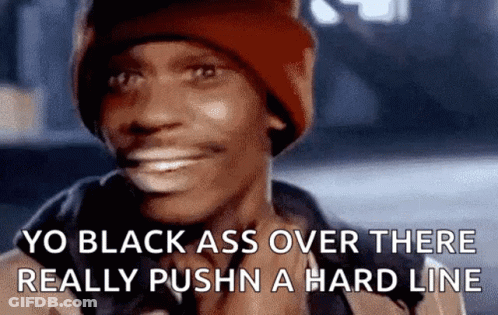 Man In Red Hat Smiling Saying Yo Black Ass Over There Really Pushn A Hard Line GIF