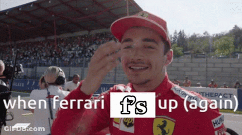 Man In Red Hat Smiling When Ferrari Fs Up Again GIF