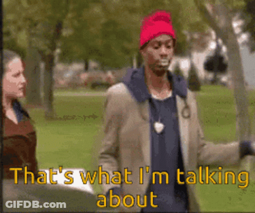 Man In Red Hat Talking To Woman GIF