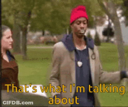 Man In Red Hat Talking To Woman GIF