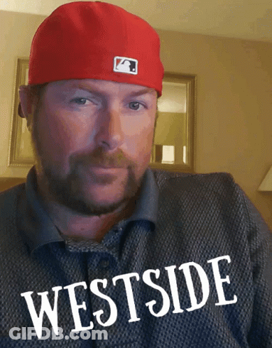 Man In Red Hat Wearing Westside Shirt GIF