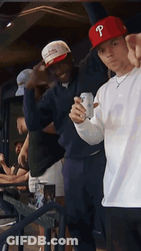 Man In Red Hat With Letter P Holding Beer GIF