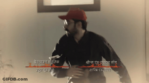 Man In Red Hat With Sign A GIF