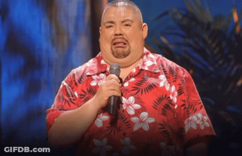Man In Red Hawaiian Shirt Holding Microphone GIF