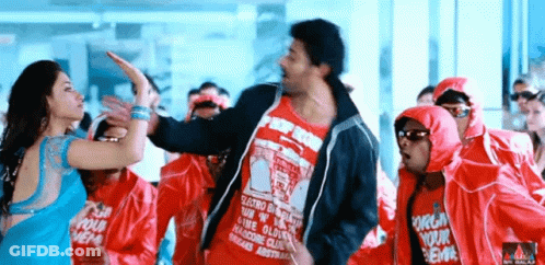 Man In Red Hip Hop Shirt Dancing With Woman GIF