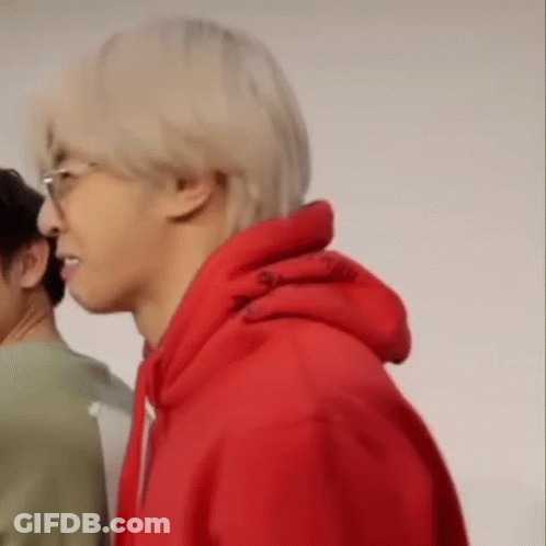 Man In Red Hoodie And Glasses Beside Man In Green Shirt GIF