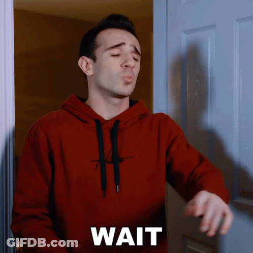 Man In Red Hoodie At Door Saying Wait GIF