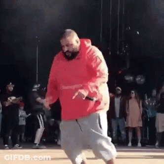 Man In Red Hoodie Dancing In Front Of Crowd GIF