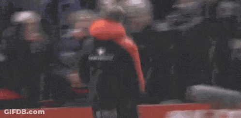 Man In Red Hoodie Helped By Man In Orange Vest GIF