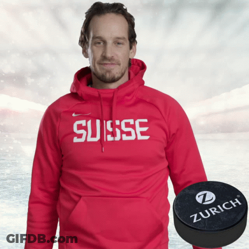 Man In Red Hoodie Saying Suisse Next To Zurich Puck GIF