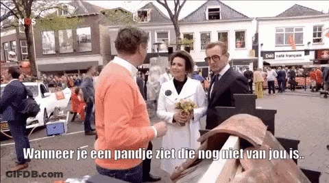 Man In Red Hoodie Talking To Another Man GIF