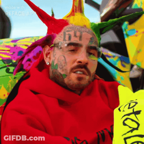 Man In Red Hoodie With Face Tattoo 99 GIF