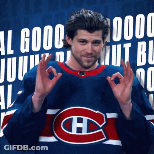 Man In Red Hoodie With Real Text On Mattress GIF