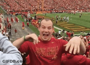 Man In Red Iowa State Cyclones Shirt At Football Field GIF