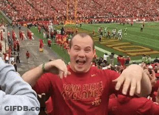 Man In Red Iowa State Cyclones Shirt At Football Field GIF