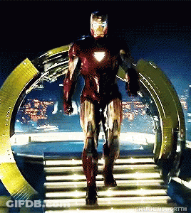 Man In Red Iron Man Suit Walking Down Stairs GIF