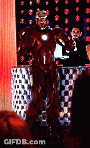 Man In Red Iron Man Suit With Crowd GIF