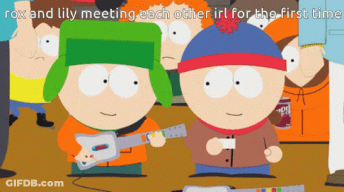 Man In Red Jacket And Beanie Beside Woman GIF
