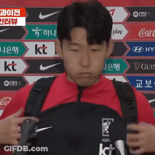 Man In Red Jacket And Black Backpack Korea GIF
